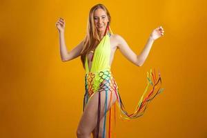 Beautiful woman dressed for carnival night. Smiling woman ready to enjoy the carnival. photo