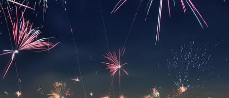 Long time exposure of fireworks over the roofs of vienna photo