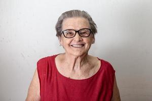 Beautiful older woman laughing and smiling. Smiling elderly woman. photo