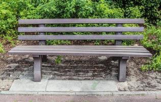 A public empty bench found in northern Europe photo