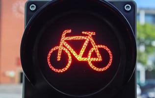 Green and red traffic lights for pedestrian and bicycles photo
