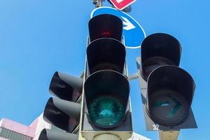 Green and red traffic lights for pedestrian and bicycles photo