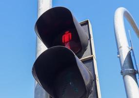 Green and red traffic lights for pedestrian and bicycles photo