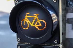 Green and red traffic lights for pedestrian and bicycles photo