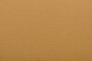 brown paper corrugated sheet board surface photo