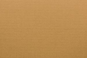 brown paper corrugated sheet board surface photo