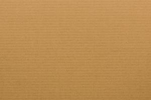 brown paper corrugated sheet board surface photo