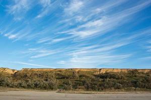 Beautiful summer landscapes with clay cliffs and blue sky photo