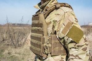 Close up of army uniform on the soldier photo