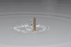 screw and water drops photo