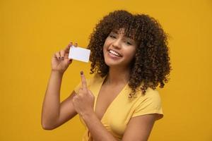 Young woman hand hold blank white card mockup with rounded corners. Plain call-card mock up template holding arm. Plastic credit namecard display front. Check offset card design. Business branding. photo