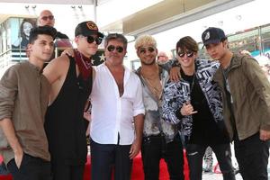LOS ANGELES, AUG 22 - CNCO, Simon Cowell at the Simon Cowell Star Ceremony on the Hollywood Walk of Fame on August 22, 2018 in Los Angeles, CA photo