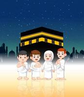 two children with their parents are doing pilgrimage in front of kaaba