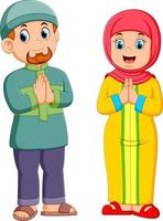 a woman and a men are giving the greeting forgiveness of ied mubarak vector