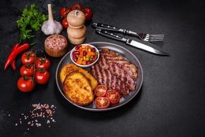 Slices of delicious grilled bacon with croutons fried in egg with spices, salt, vegetables and herbs photo