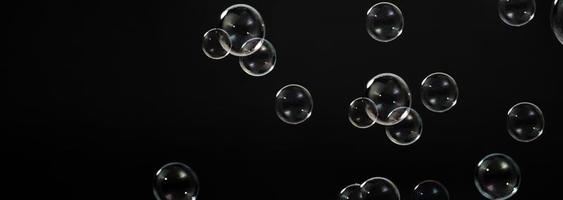 Soap bubble drop or Shampoo bubbles floating like flying in the air photo