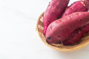 Japanese sweet potatoes on basket photo