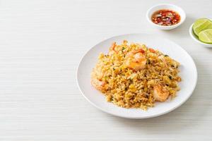 fried shrimps fried rice on plate photo