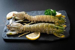fresh mantis shrimp with lemon photo