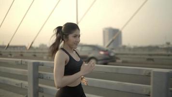 fit young woman running athlete sprinting fast running intense workout challenge training endurance in urban city on morning or evening video