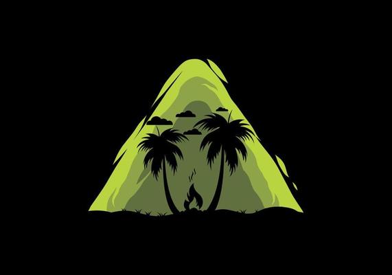 Silhouette of bonfire and coconut trees on the beach