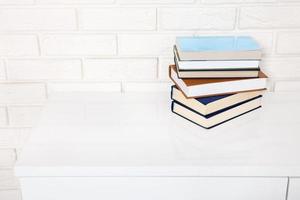 Workplace and education accessories on white table. Selective focus and copy space. Business school concept photo