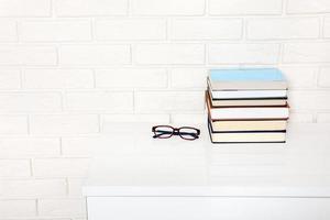 Workplace and education accessories on white table. Selective focus and copy space. Business school concept photo