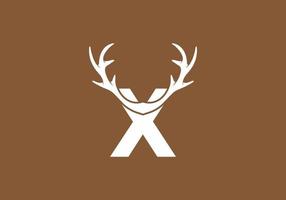 White brown color of X initial letter with deer horn vector