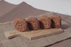 Square-shaped chocolate biscuits are suitable as a side snack to the breakfast menu. Start the morning with biscuits. Can be consumed by all ages from toddlers to the elderly. Stack of biscuits. photo
