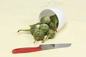 Eggplant is one of the vegetables in the form of fruit. Fruit-producing plants used as vegetables. Green eggplant is round and mini has a different taste from other eggplants. photo