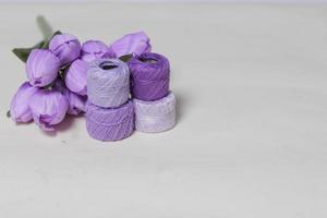 Embroidery thread made especially for embroidery. Yarn with a fine and soft texture. Embroidery threads of various colors. Yarn mockup. Focus blur. photo