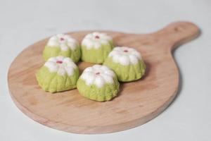 Putu Ayu as a snack in your spare time. Putu Ayu has a soft and tender texture. This putu cake has a very delicious and soft taste when eaten. Indonesian food. Has a pandan scent. Focus blur. photo