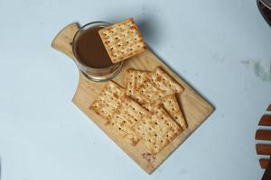 Roma biscuits served with coffee, perfect for relaxing. Foods made from wheat are able to delay hunger and also for breakfast in the morning. 'biscuit' from Latin,  bis coctus which means twice photo