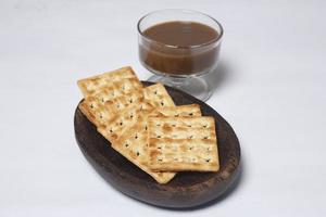 Roma biscuits served with coffee, perfect for relaxing. Foods made from wheat are able to delay hunger and also for breakfast in the morning. 'biscuit' from Latin,  bis coctus which means twice photo