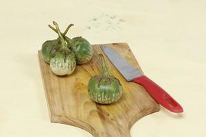 Eggplant is one of the vegetables in the form of fruit. Fruit-producing plants used as vegetables. Green eggplant is round and mini has a different taste from other eggplants. photo