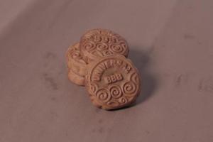 Square-shaped chocolate biscuits are suitable as a side snack to the breakfast menu. Start the morning with biscuits. Can be consumed by all ages from toddlers to the elderly. Stack of biscuits. photo