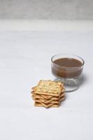 Roma biscuits served with coffee, perfect for relaxing. Foods made from wheat are able to delay hunger and also for breakfast in the morning. 'biscuit' from Latin,  bis coctus which means twice photo