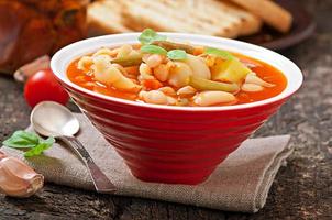 Minestrone, italian vegetable soup with pasta photo