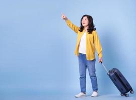 Full length image of middle aged Asian woman on background, summer concept photo
