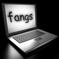 fangs word on laptop photo