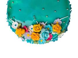 Top view Closeup Blue ocean jam cake decorations with Colorful Icing fruits photo