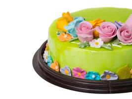 Closeup Green apple jam cake decorations with Colorful Icing fruits photo