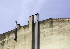 Chimneys on a facade photo