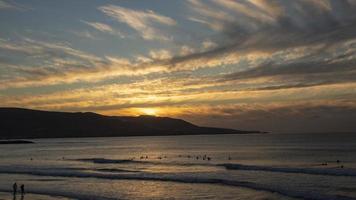 sunset on the sunset Canteras beach in Las Palmas city photo