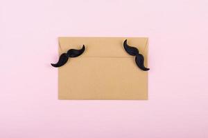 Mockup with blank paper and mustaches. Happy Fathers day. Background of fathers day. Top view. Flat lay. photo