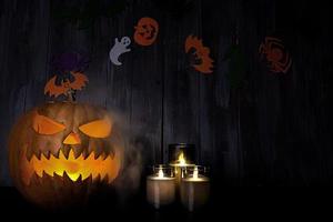 fondo de halloween con linterna de cabeza de calabaza y velas. calabaza de halloween jack-o-lantern foto