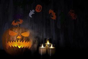 Halloween background with pumpkin head lantern and candles. Halloween pumpkin Jack-o-Lantern photo