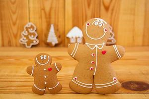 Christmas gingerbread cookies on wooden background