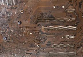 Textures, old motherboard schematics, streaks, soldering points. photo