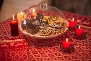 Christmas candles and cakes photo